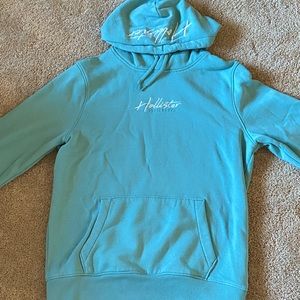 Brand: Hollister, Blue Hoodie (with strings), Size Small